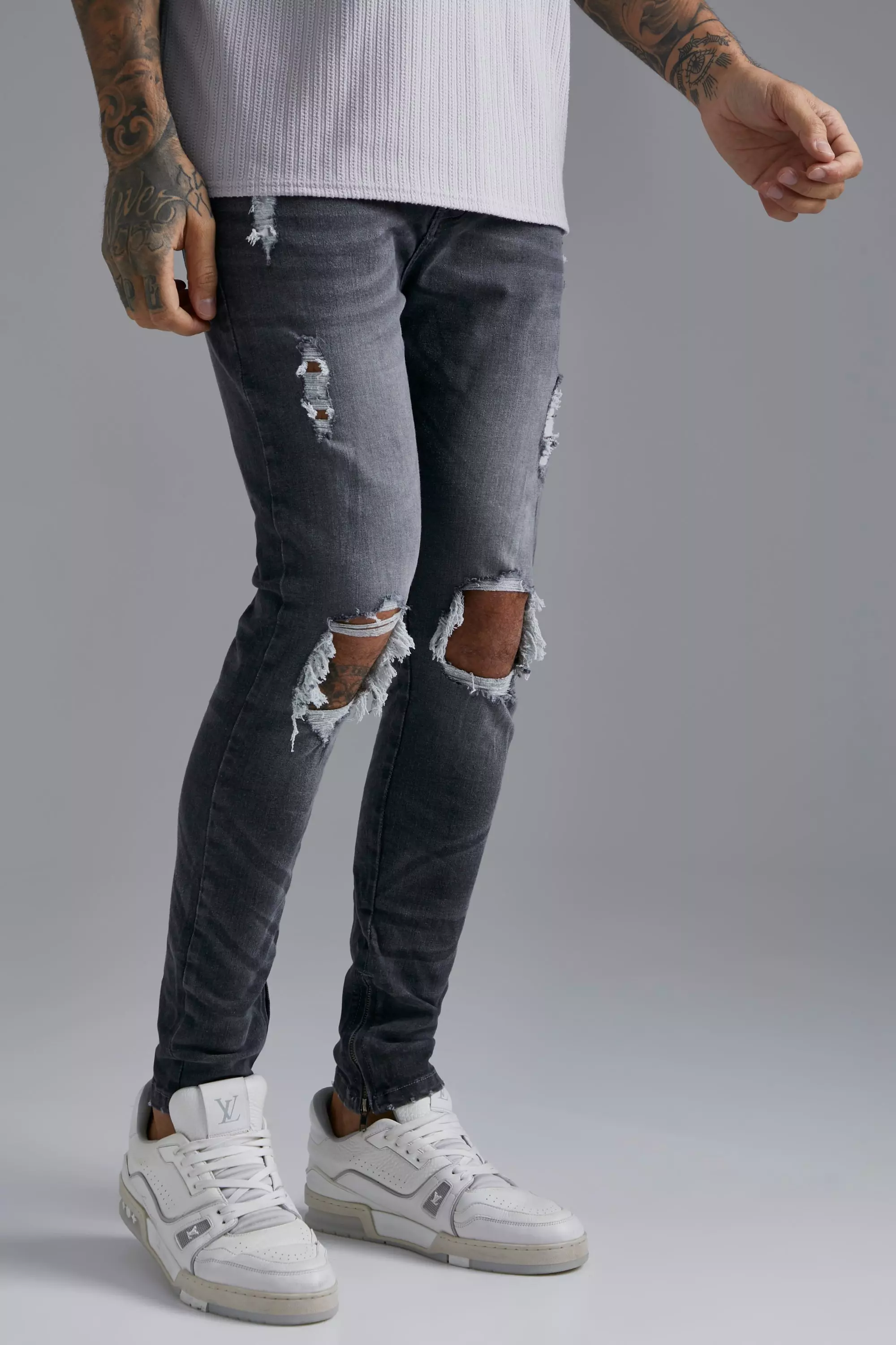 Knee rip best sale jeans mens